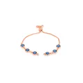 Détail du bracelet bolo en or rose avec six pierres bleues et une chaîne réglable - Aqua