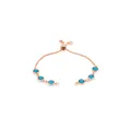 Détail d'un bracelet bolo en or rose avec six pierres bleues et fermoir ajustable - Bleu ciel