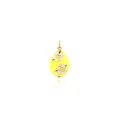 Detailed view of yellow enamel egg pendant with white flower patterns and gold trim - Yellow