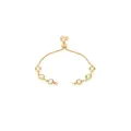 18K gold plated friendship bracelet with six round light green gemstones and bolo closure - Champagne