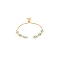 Detail of 18K gold-plated friendship bracelet with six light blue round gemstones and sliding clasp - Lake Blue