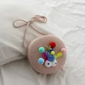 Mini bolso bandolera de punto rosa para niñas con ojos grandes y pompones de colores - Rosa