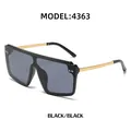 Flat top oversize sunglasses featuring a black frame and golden metal temples - Bright Black