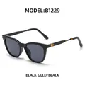 Chic black and gold cat-eye sunglasses with metal hinges and high-quality dark lenses - Gold Black