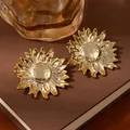 Chic gold sunflower stud earrings with textured hammer finish and vintage metal petals - Golden Sunflower Hammered Floral Earrings (S2295-1)