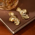 Minimalist gold petal earrings with irregular wavy shape and high-polish metallic finish - Golden Irregular Wavy Undulating Earrings (S2238-1)