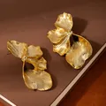 Statement oversized golden ginkgo leaf earrings with brushed metal finish - Golden Brushed Ginkgo Leaf Pleated Earrings (S2265-1)