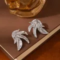 Abstract silver leaf earrings with a modern polished finish in a layered petal design - Silver Streamlined Leaf Flame Earrings (S2379-1)
