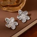 Minimalist silver flower petal stud earrings with polished metallic stripe texture - Silver 3D Five-Petal Flower Earrings (S2386-1)