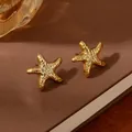 Statement golden starfish earrings with hammered metallic texture in a minimalist design - Golden Starfish Hammered Texture Earrings (S2386-2)
