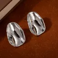 Minimalist liquid metal floral stud earrings in bright silver with organic wavy texture - Silver Irregular Liquid Metal Earrings (S2456-1)
