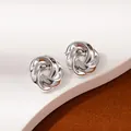 Polished silver knot earrings in a minimalist twisted layered petal design for women - Silver Twisted Intertwined Knot Earrings (S2474-2)