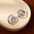 Modern silver spiral earrings with polished mirror finish in minimalist artistic style - Silver Swirl Spiral Rotating Earrings (S2511-4)
