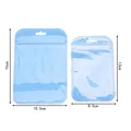 Close-up of holographic blue resealable bags showing display holes and zipper closure details - 13*8.5cm / Blue