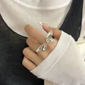 Bague papillon artistique en argent sterling 925 avec une texture de métal liquide unique - Style de Papillon en Métal Liquide (J7052)