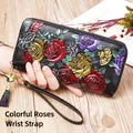 Women's long leather wallet featuring colorful rose embossing and a flower tassel - Colorful Rose