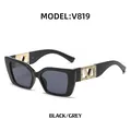 Fashionable black square sunglasses with grey lenses and gold V-shaped metal temple detail - Black Frame/Grey Lens