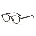 Stylish oval tortoiseshell optical frames for women featuring silver dot metal accents - Tortoiseshell
