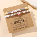 Stack of colorful clay bead bracelets with TEACH letters and a red apple charm pendant - D1010-1 (2Pcs Set-Grey/Yellow/White)