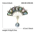 Elegante spilla a ventaglio in conchiglia con strass e ciondolo a perla grigia - Nero (MM-BR-4998-BK)