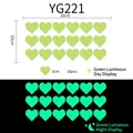Luminous heart wall sticker set with 18 pieces showing green glow effect in darkness - Yg-221 [18 Hearts]