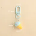Light blue resin ice cream keychain with dimensions showing lobster clasp and cone pendant - Light Blue