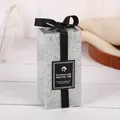 Light gray square pillar candle with ice crystal texture and black ribbon bow detail - Grey - African White Orchid