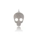 Macro view of silver skull pendant with sparkling full diamond pavé setting and top ring - Silver