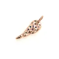 Macro shot of rose gold wing pendant with textured metal and multicolored zircons - Rose Gold
