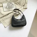 Chic black litchi pattern crescent underarm bag with modern metal bar accent - US 6 / Black