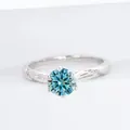 Elegant S925 silver ring featuring a round blue moissanite stone in a six-prong setting - US Size 5 / Blue