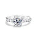 Classic S925 sterling silver ring with a large moissanite and side stones in silver - White