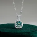 Luxurious S925 silver necklace featuring a cyan-blue 1ct moissanite halo pendant - Teal