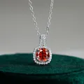 Elegant S925 silver necklace featuring a round red moissanite in a square halo setting - Garnet Red
