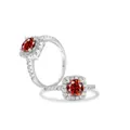 Detailed macro view of S925 silver ring featuring a red center stone and pavé diamonds - US 5 / Garnet Red