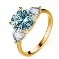 Drei-Steine-Ring mit hellblauem Rundstein und Herz-Seitensteinen in Gelbgold-Finish - Gold Original Blau
