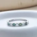 S925 sterling silver ring featuring green and white moissanite stones in a prong setting - Blue, Green, & White