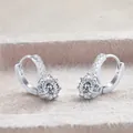 Detailed macro view of S925 sterling silver hoop earrings with six-prong moissanite setting - 1CTx2 / White 100-Facet Cut