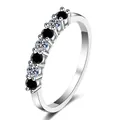 Silver 925 ring with alternating black and white round moissanite stones in prong setting - Black and White