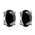 Vista macro de pendientes de moissanita negra ovalada con engaste de plata S925 - Negro