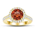 Close-up of S925 hallmark on silver ring with round halo orange gemstone and diamonds - Lucky Red
