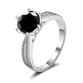 Detail of S925 silver ring featuring a six-prong set round black gemstone with side diamonds - Size 5 / Black (3 Carat)