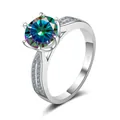 Macro shot of silver ring featuring six-prong moissanite setting and polished finish - Size 5 / Rainbow (3 Carat)