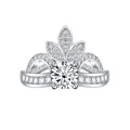 Macro shot of silver crown ring featuring a large center stone and intricate palace style - White