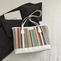 Sac fourre-tout en paille tissée à rayures avec poignées en cuir blanc et étiquette - Blanc Irisé