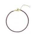 Schmales Tennisarmband aus Edelstahl mit lila Zirkonia und goldener Beschichtung - Gold - Juni Hellviolett