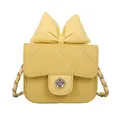Mini yellow quilted crossbody bag with bow detail and floral clasp for women - Yellow