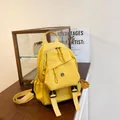 Bright yellow oxford cloth backpack for students with multiple pockets and buckle closure - Yellow