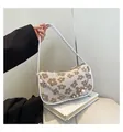 Elegant cream floral underarm bag with white trim and decorative pearl silver chain - Khaki