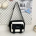 Borsa a tracolla minimalista in tela bianca e nera con tracolla regolabile - Nero